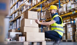 Male warehouse worker with barcode scanner