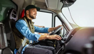 man working driving his truck