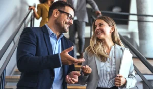 Conversation on Office Stairs During a Productive Workday